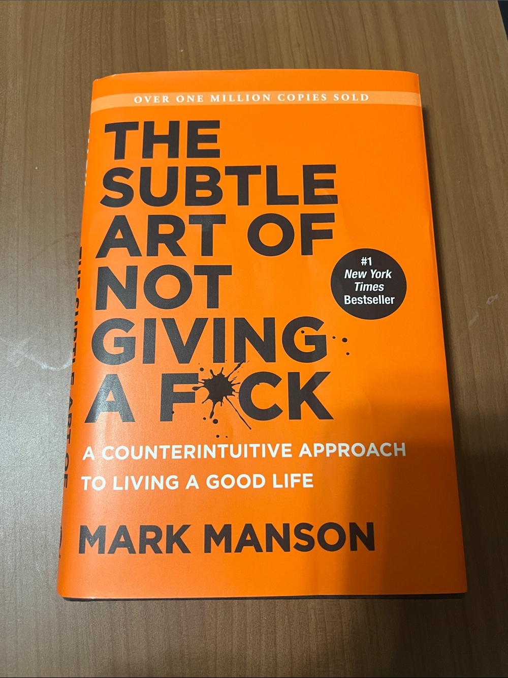The Subtle Art of Not Giving a F*ck - Orange Hardcover